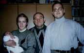 Масляевы Отец, сыновья Юрий (МВОКУ-1989), Антон (ИКСИ-2003) и младший внук Ярослав  Юрьевич Масляев 1998 на руках Крестного